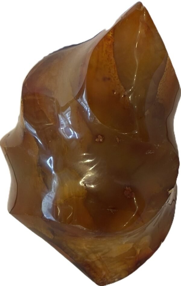 Carnelian flame 2 3 sians emporium Hand carved polished carnelian flame sculpture featuring twisting ridges with deep mahogany red burnt orange tones and smoky chalcedony patches isolated on a white background